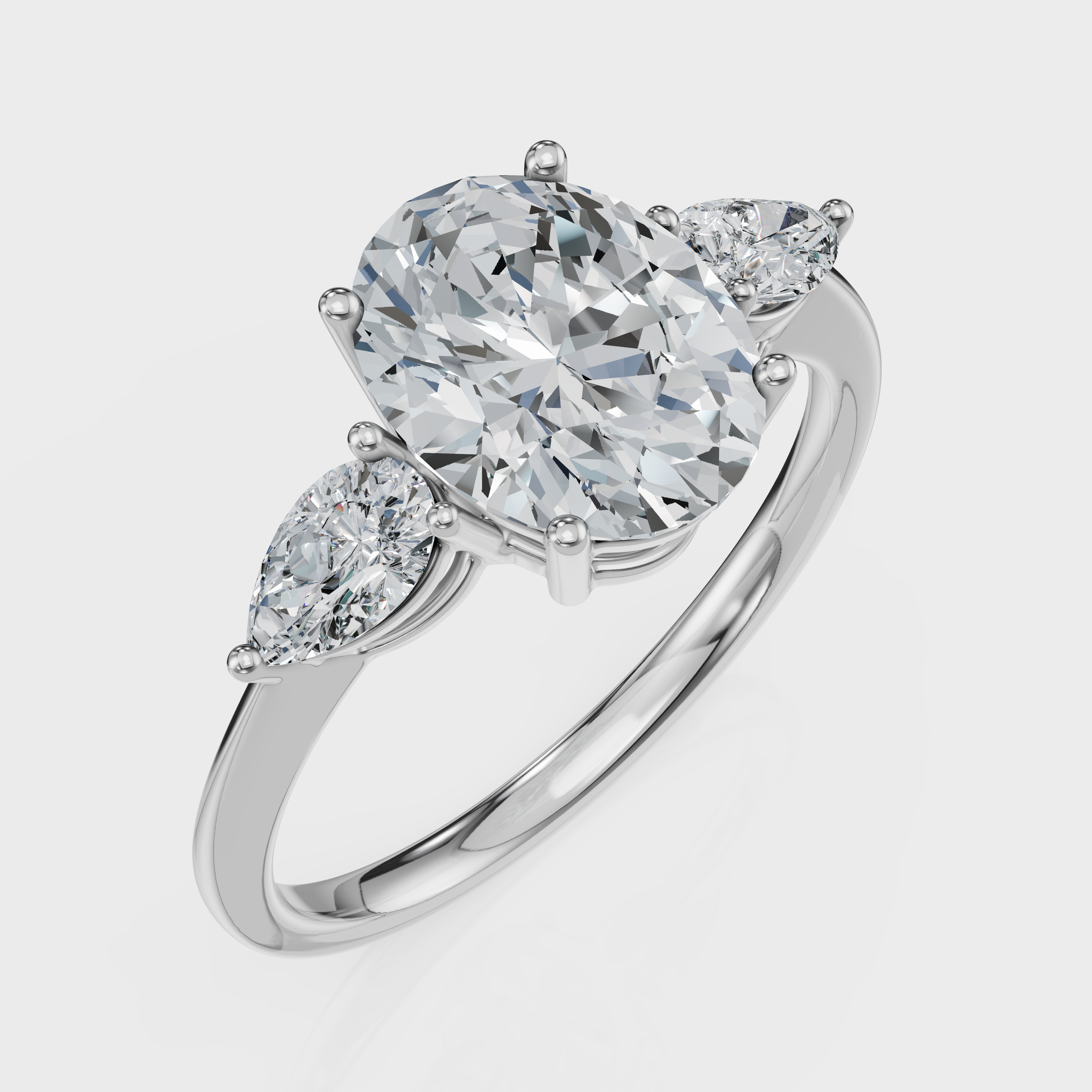 Oval Cut with Pear Side Stones Ring – Diamonds