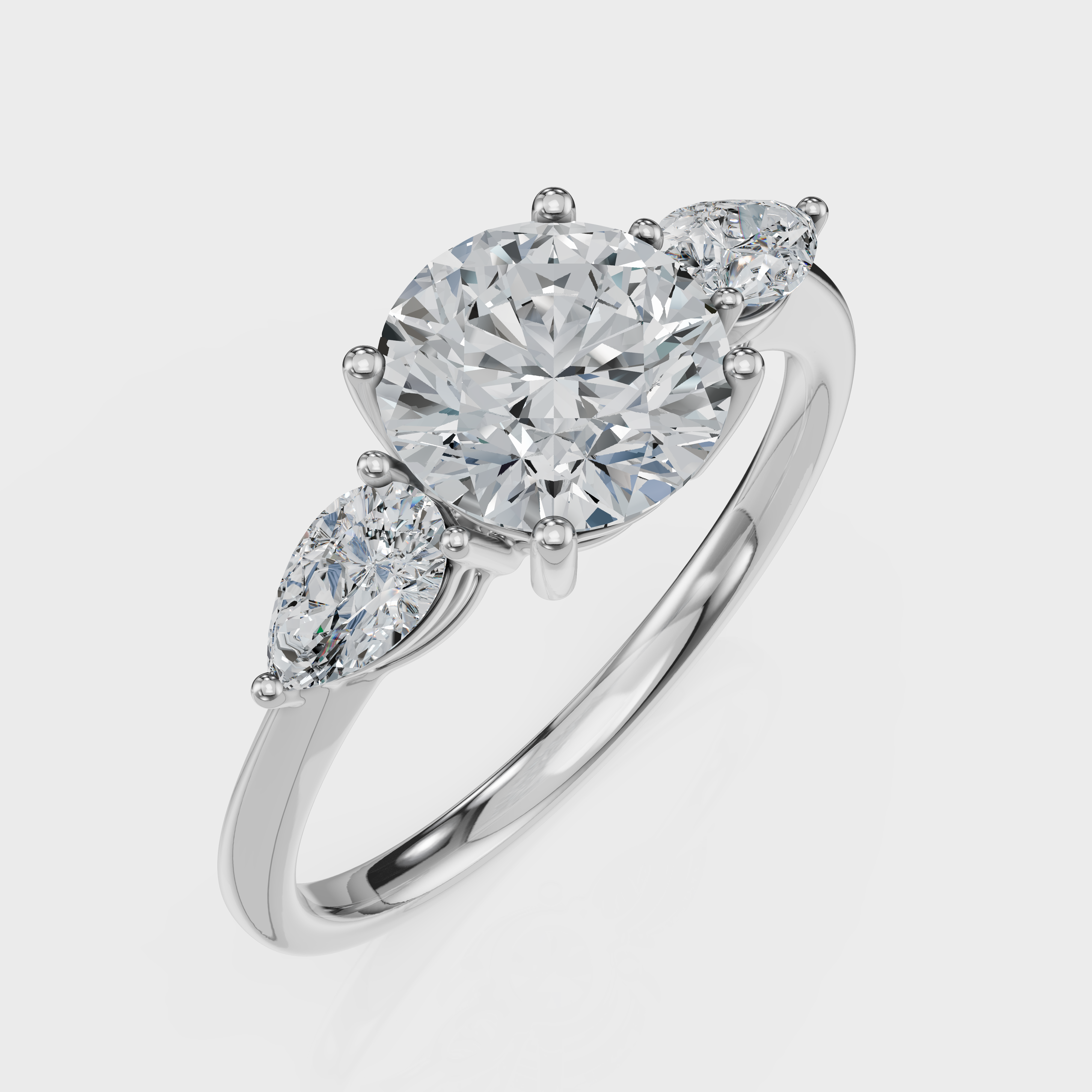 Round Cut with Pear Side Stones Ring– Diamonds