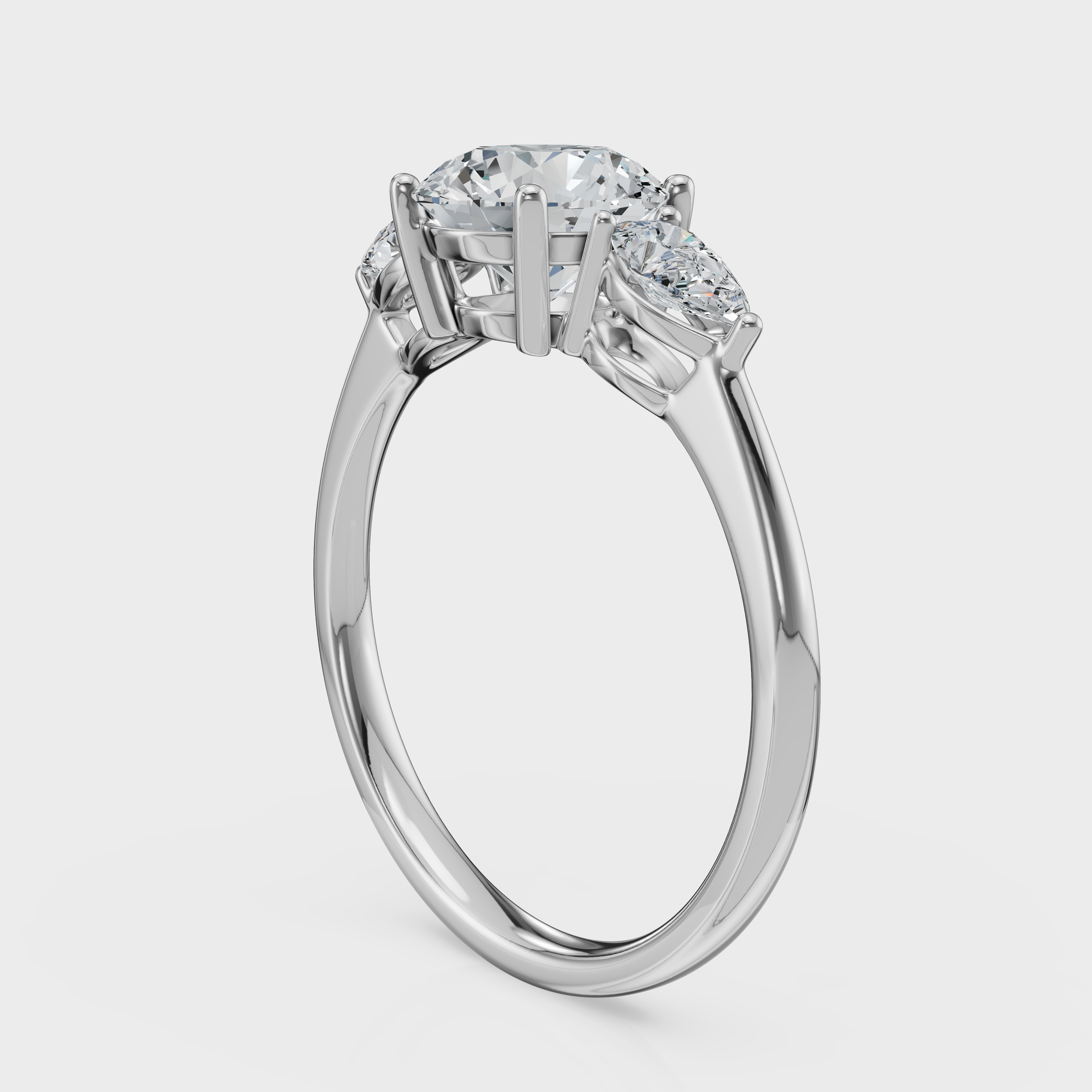 Round Cut with Pear Side Stones Ring– Diamonds