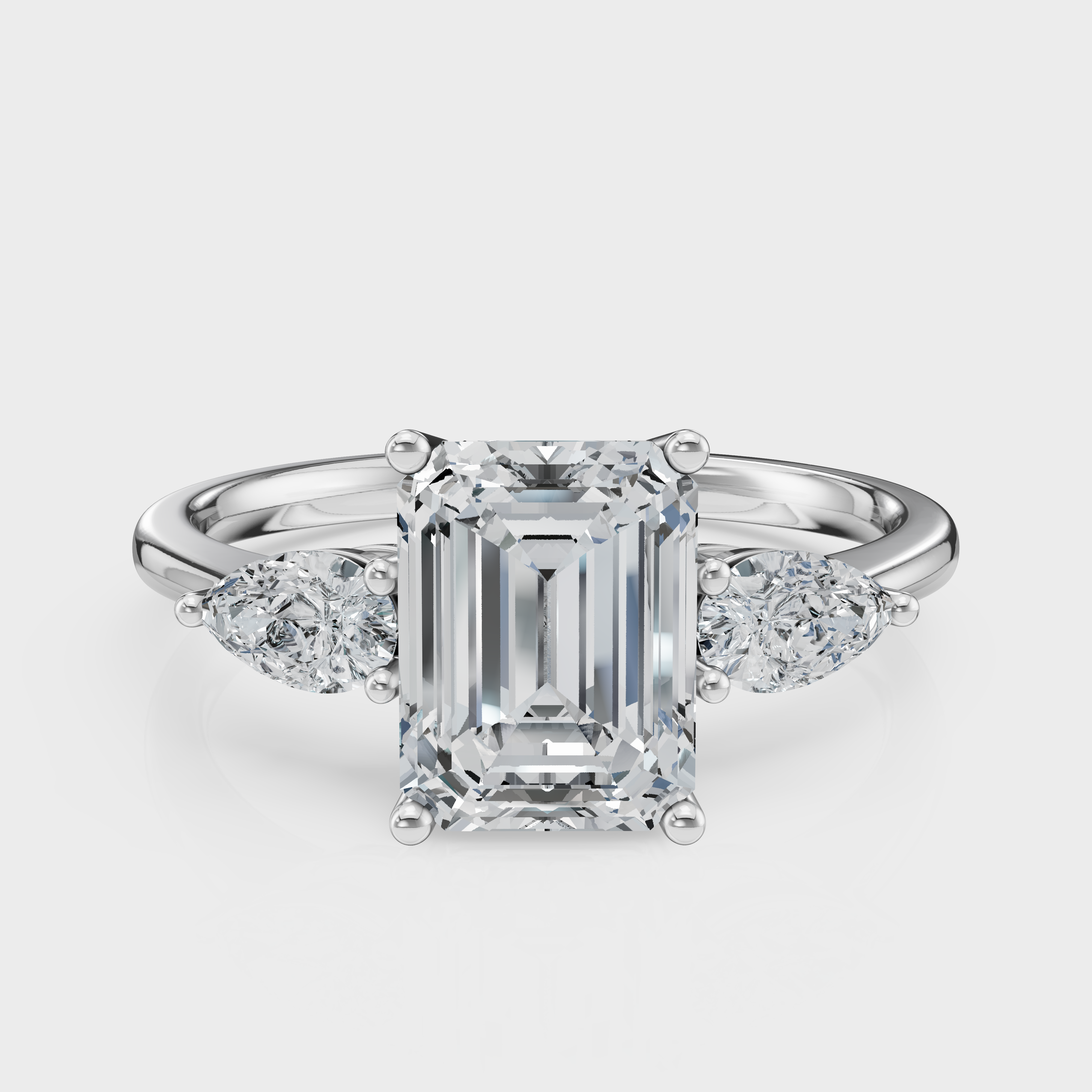 Emerald Cut with Pear Side Stones Ring – Diamonds