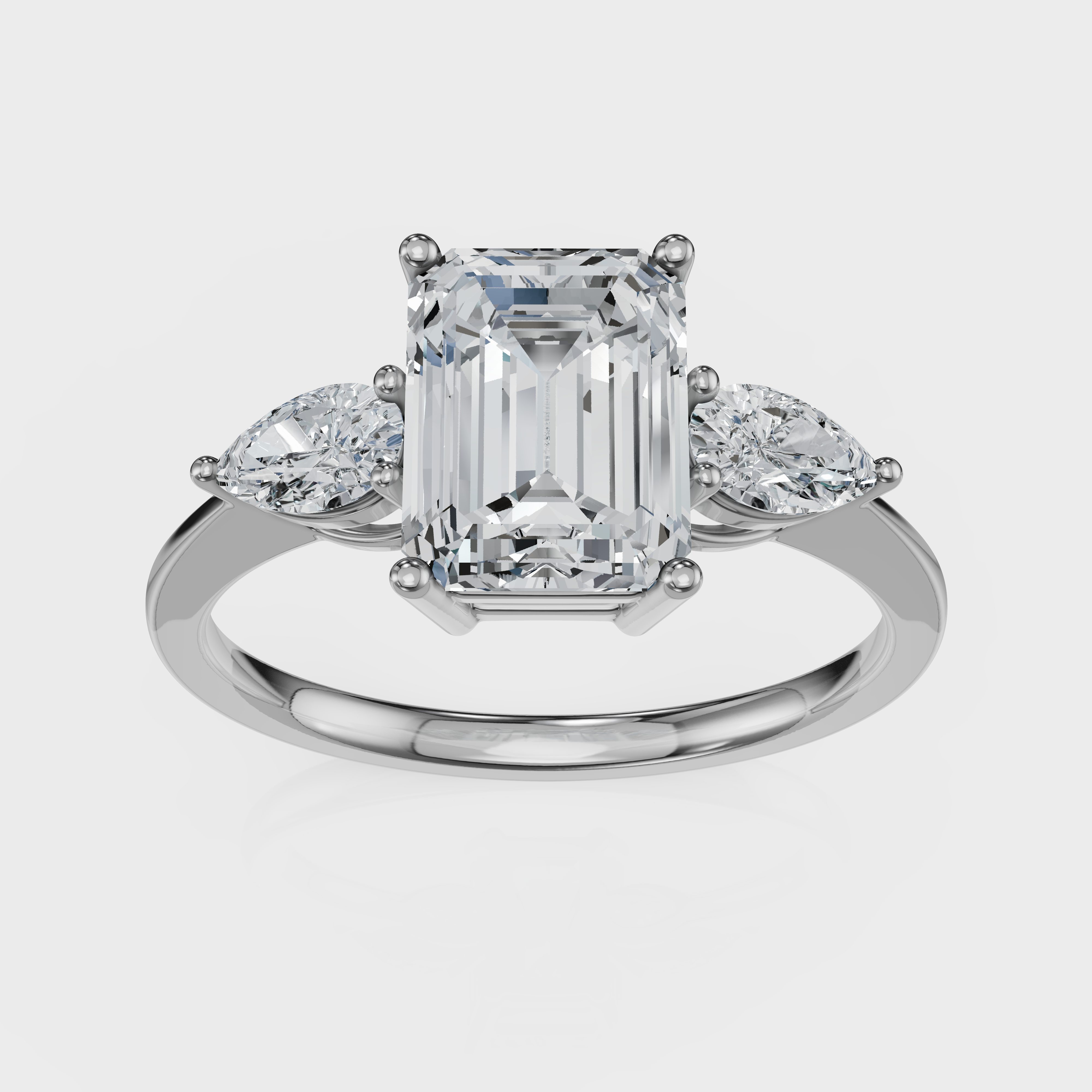 Emerald Cut with Pear Side Stones Ring – Diamonds