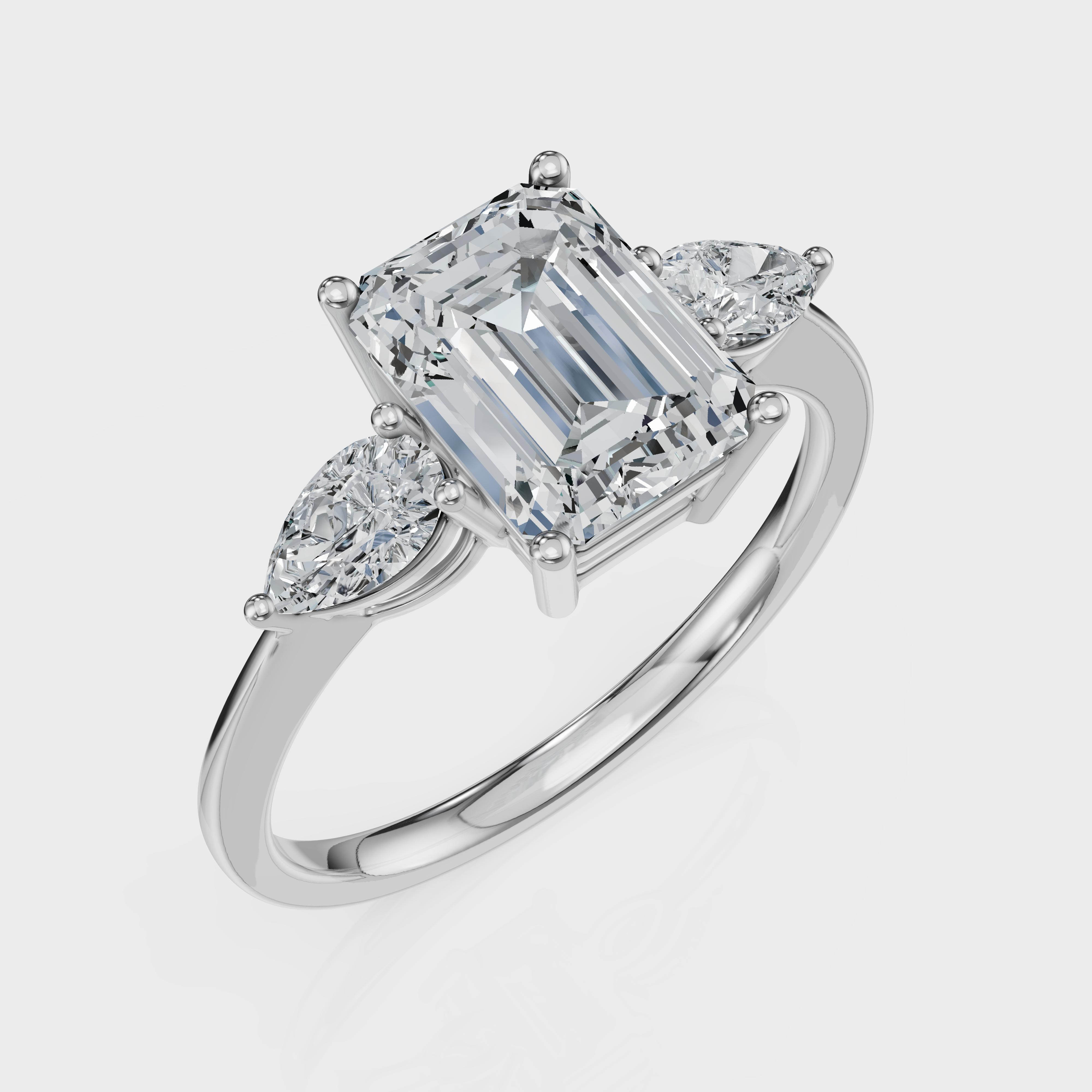 Emerald Cut with Pear Side Stones Ring – Diamonds