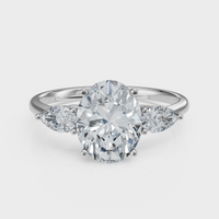 Oval Cut with Pear Side Stones Ring – Diamonds