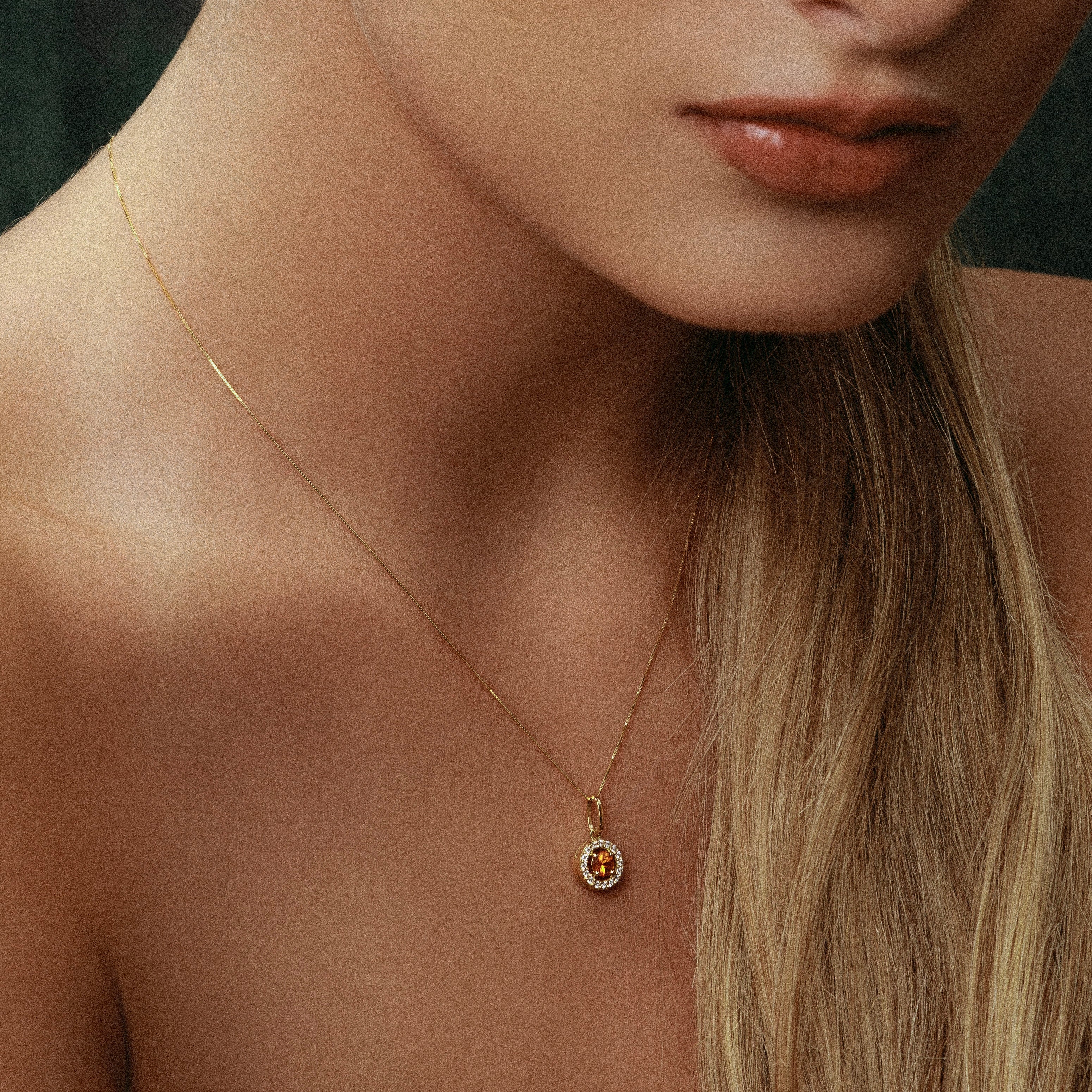 Orange Sapphire & Diamond Halo Necklace in Yellow Gold