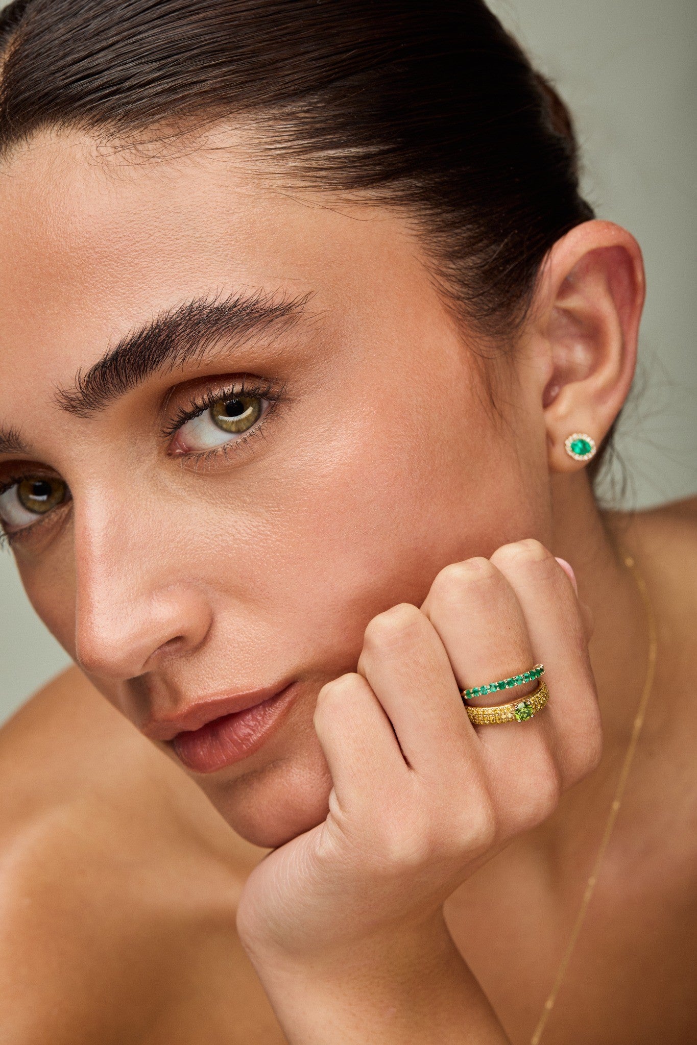 Oval Emerald Studs with Diamond Halo