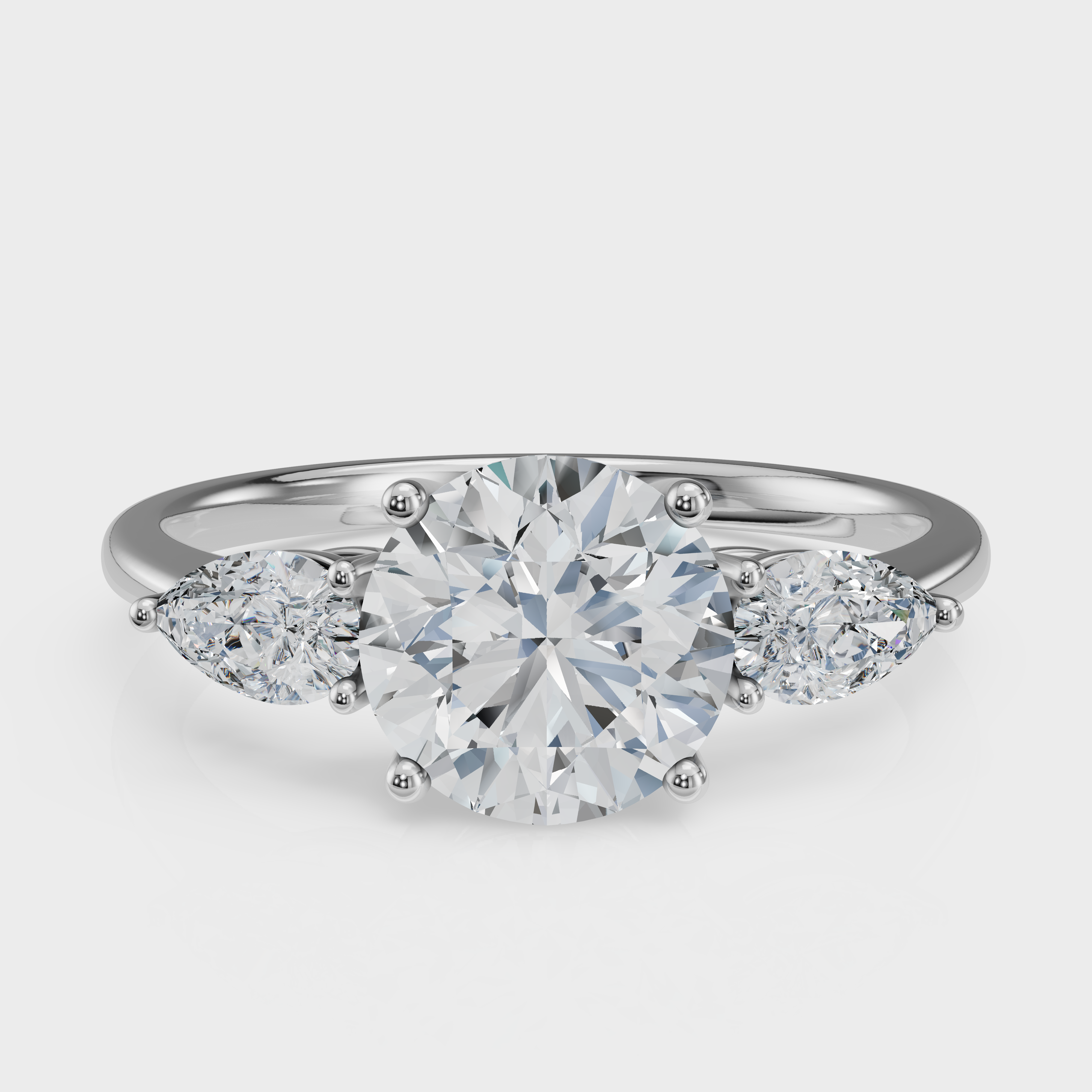 Round Cut with Pear Side Stones Ring– Diamonds
