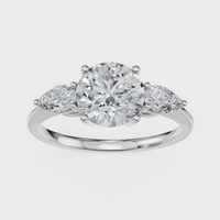 Round Cut with Pear Side Stones Ring– Diamonds