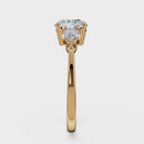 Round Cut with Pear Side Stones Ring– Diamonds